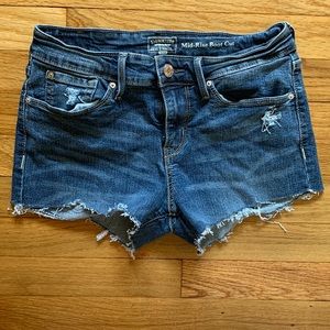 Mid-Rise Distressed Jean Shorts
